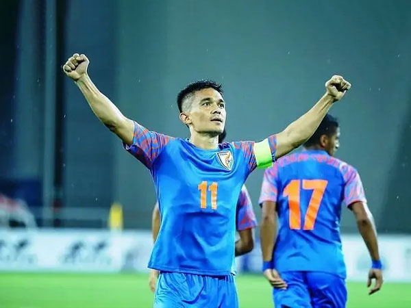 Sunil Chhetri celebrating by extending his arms after scoring